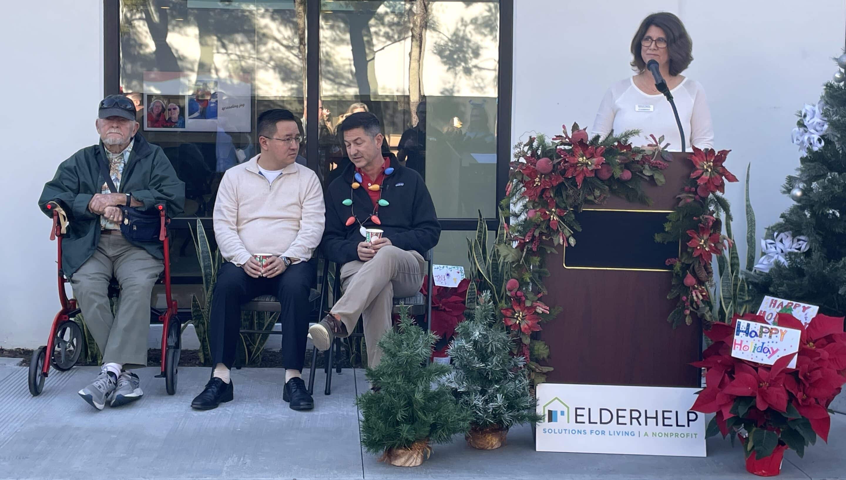 Elderhelp - Deb Smiling Podium cropped scaled